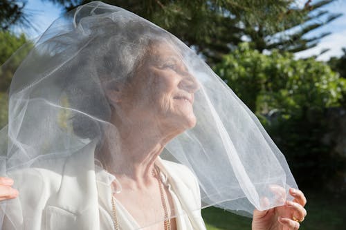 Portrait of an Elderly Woman Touching Her Veil