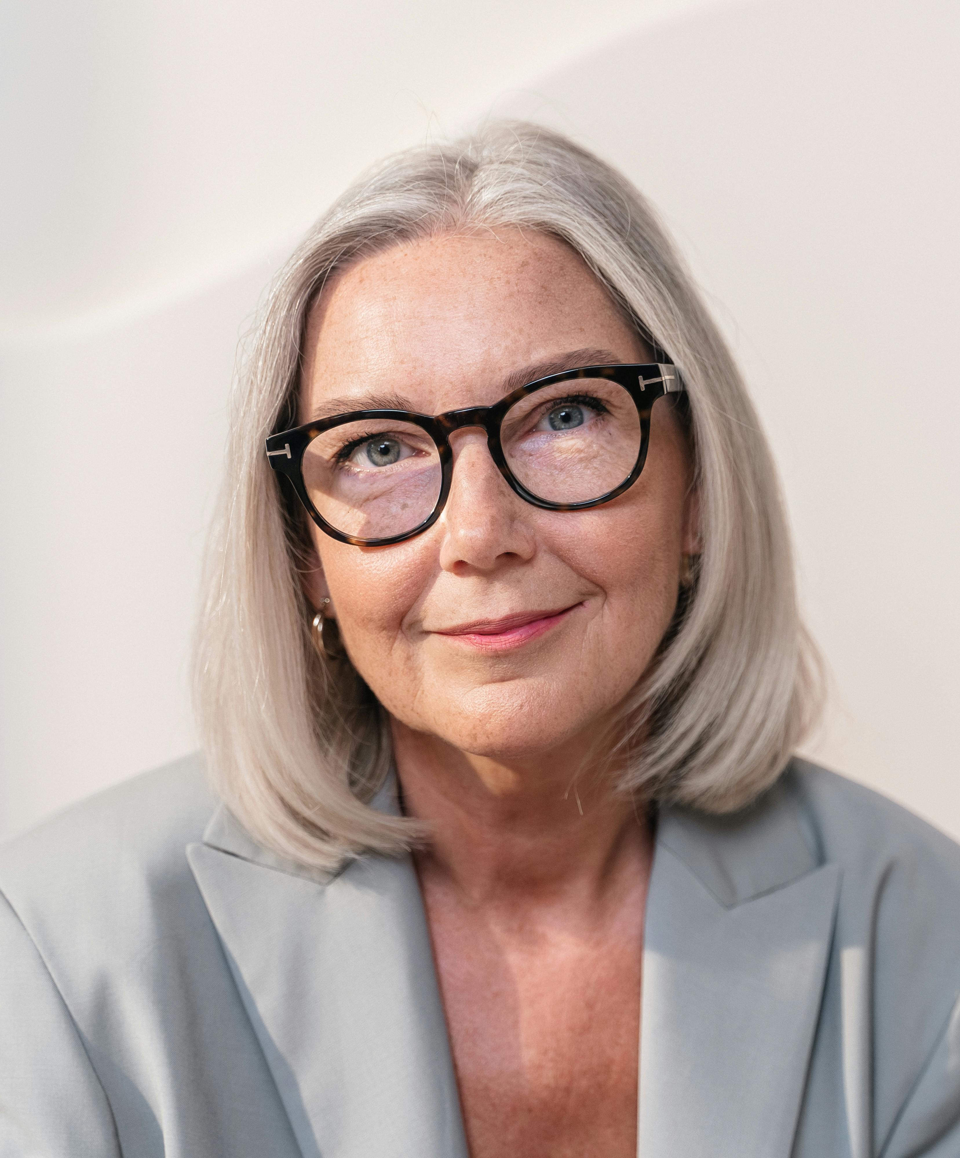 portrait of beautiful elderly woman in glasses