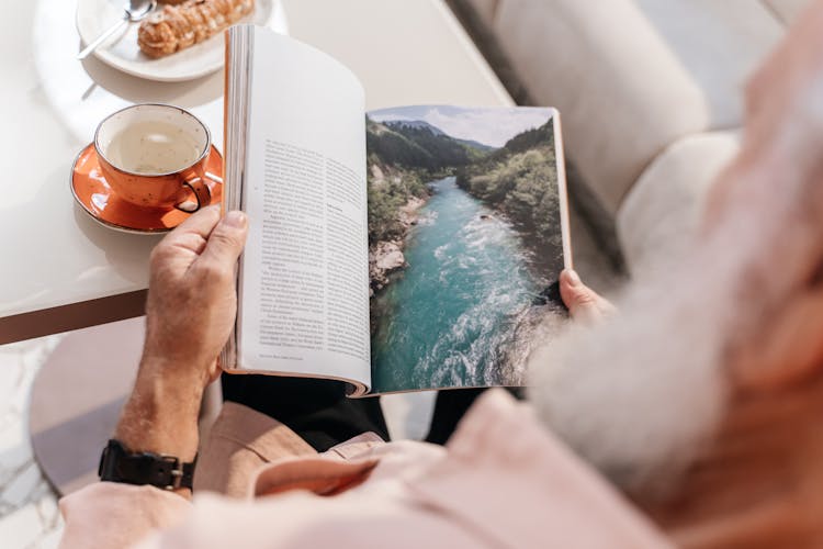 Man Holding A Book 