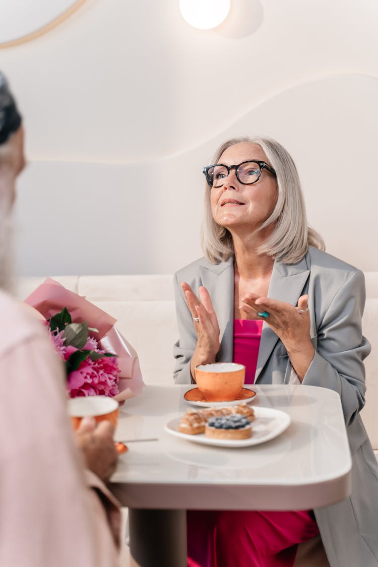 Elderly Couple In Cafe Together