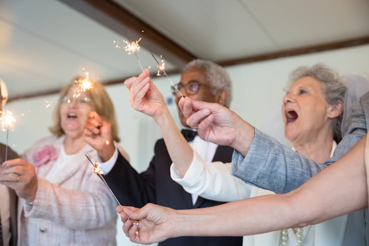 Group Of People Holding Firecrackers