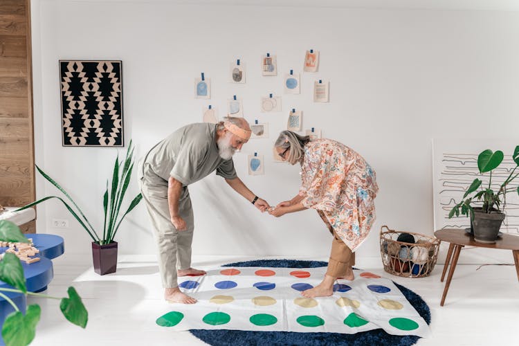 Elderly Couple Playing Twister