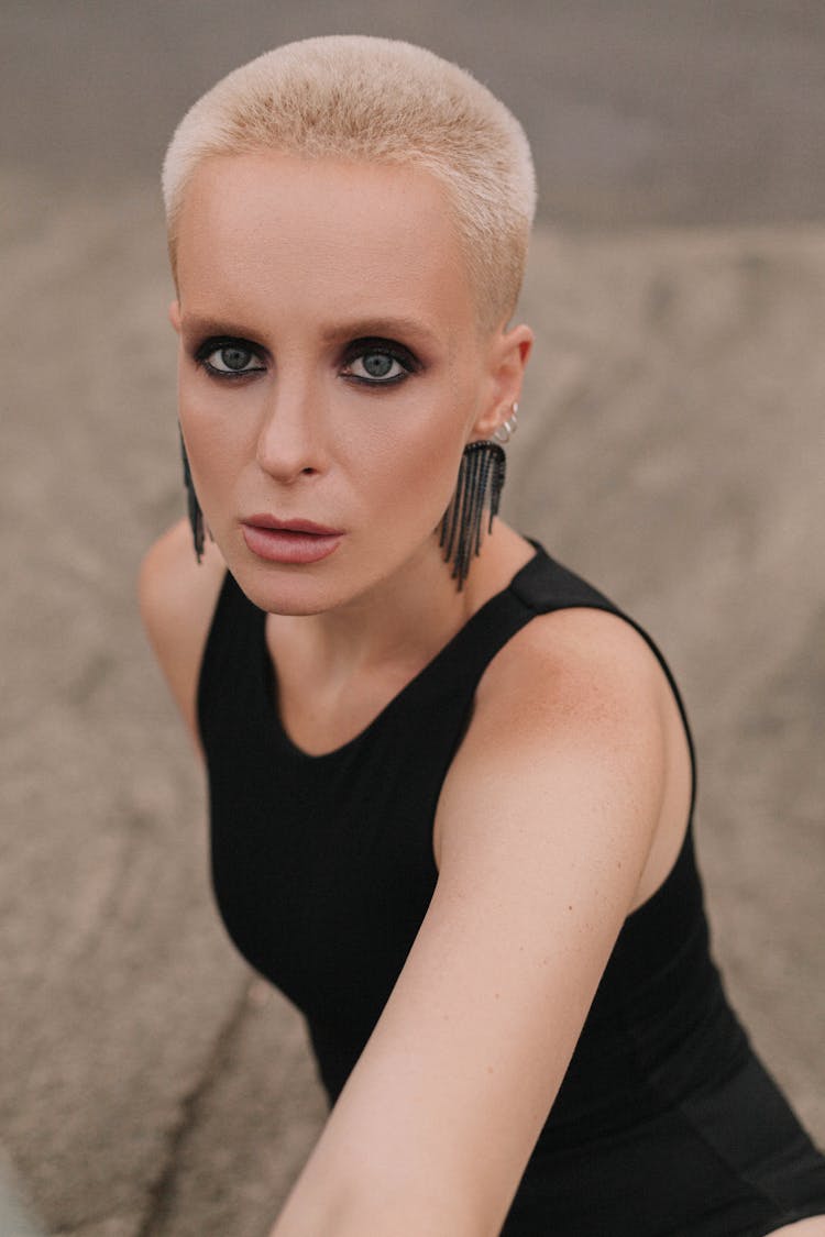 Woman In Black Tank Top With Earrings 