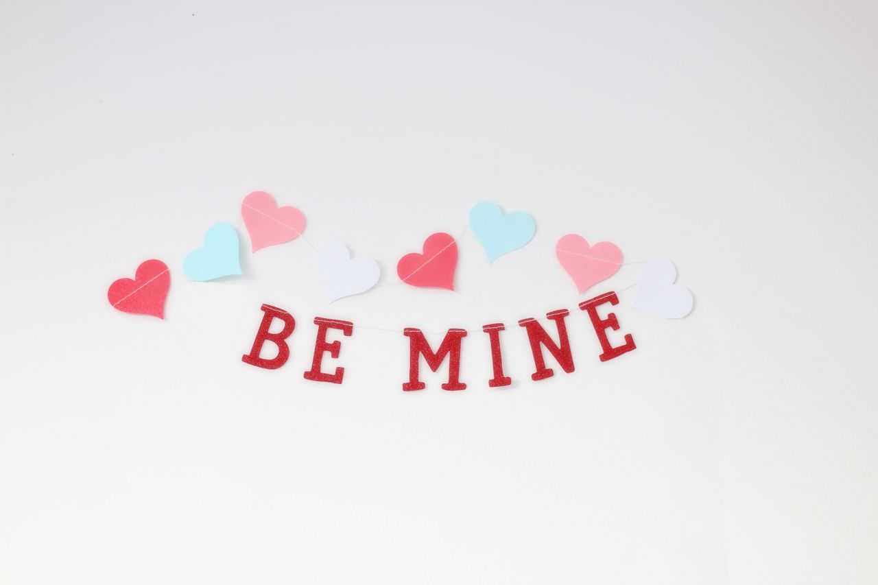 charming arrangement of colorful hearts and be mine text perfect for v