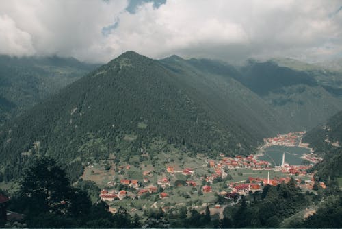 Aerial Photography of a Town by the Mountain