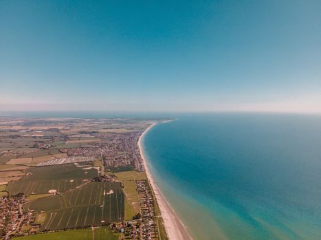 A stunning aerial view of West Wittering Beach and countryside, showcasing Britain's natural beauty.