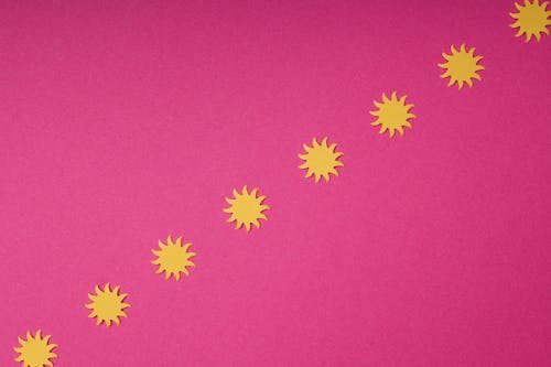 Paper Sun on Pink Surface