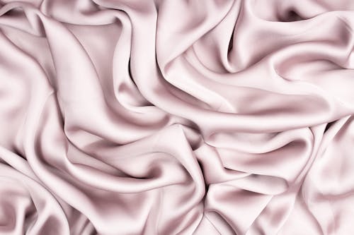 Close-Up Shot of Light Pink Satin