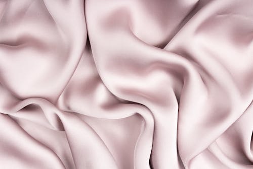 Close-Up Shot of Light Pink Satin