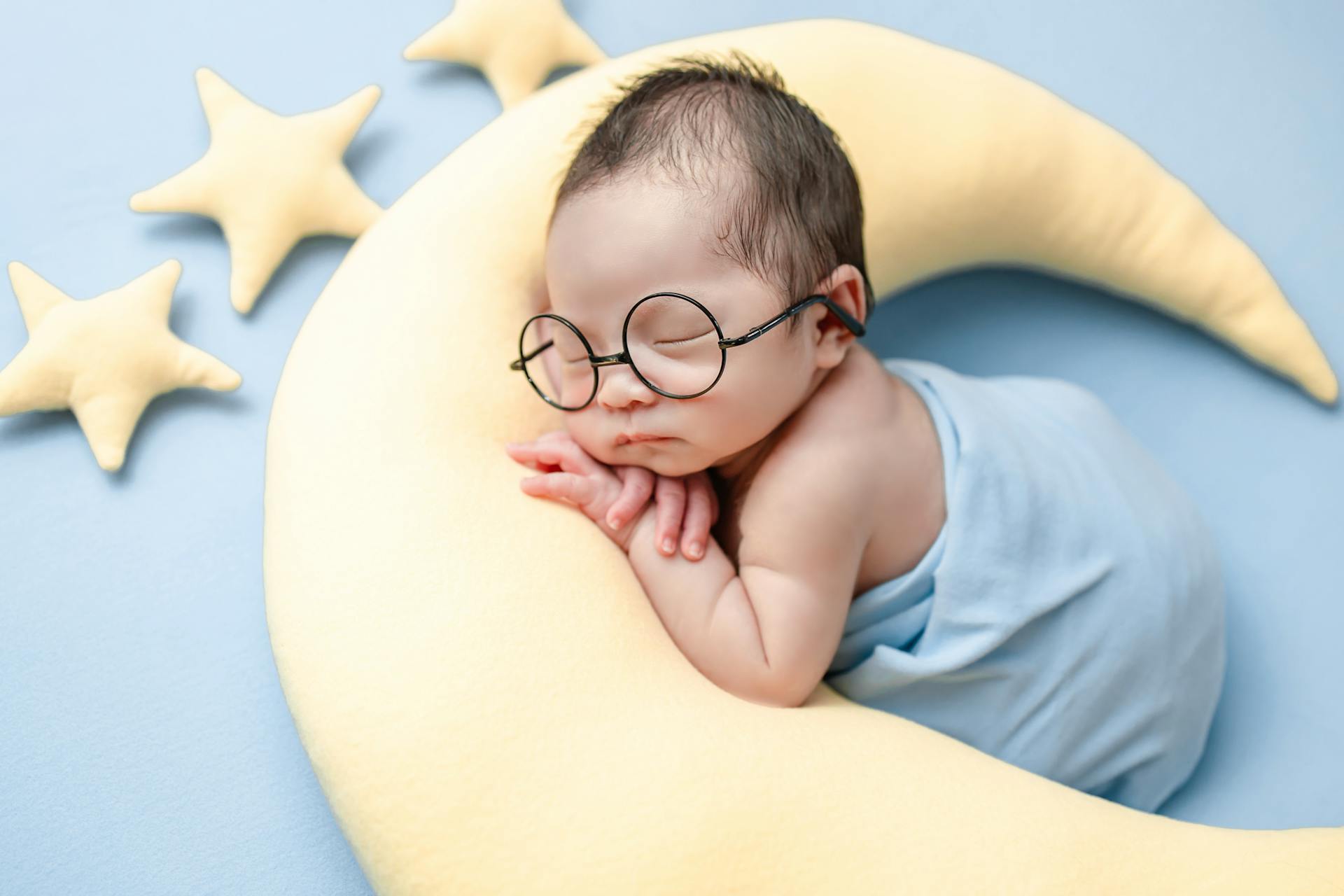 Adorable Newborn Having a Photoshoot