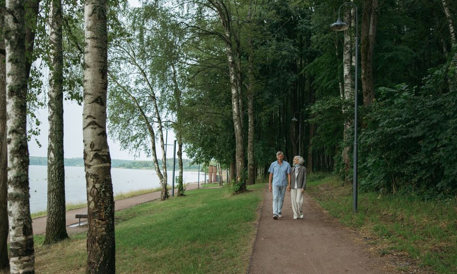 Mature couple enjoying a walk in a park