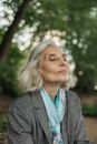 Woman in Gray Blazer Smiling