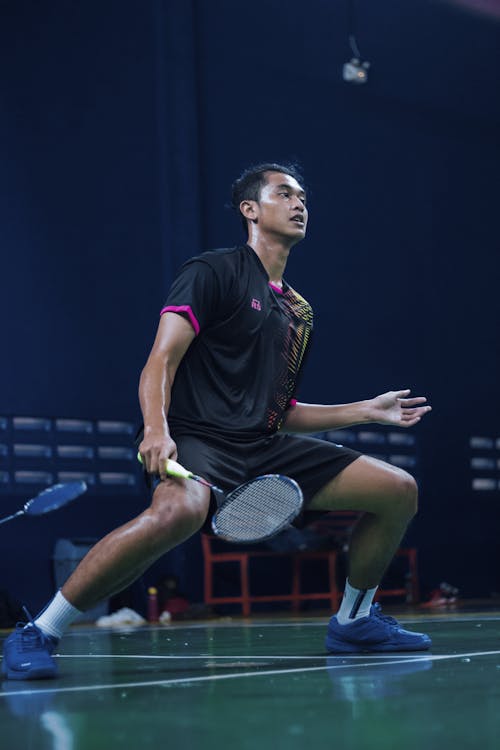Free Badminton Player on a Court  Stock Photo