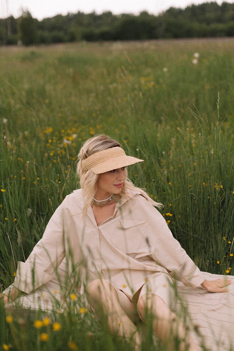 Woman Wearing Long Sleeves Polo Sitting On Grass