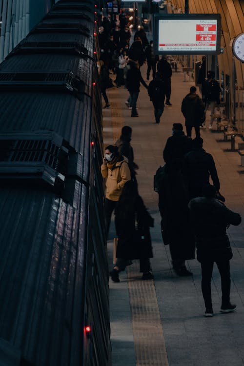 People At A Train Station During Pandemic