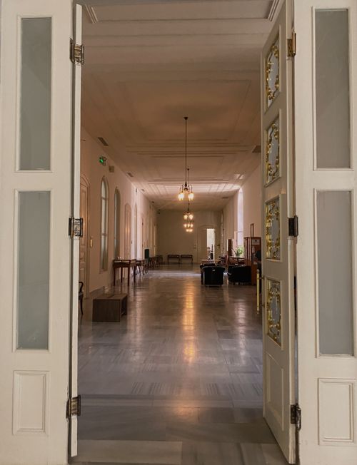 Free Discover the timeless elegance and spacious design of an Istanbul palace's interior hallway, showcasing classic architecture. Stock Photo