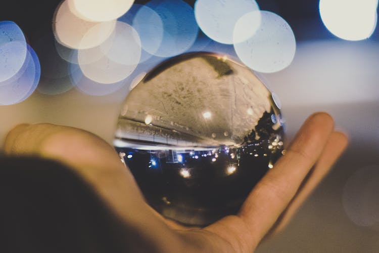 Crystal Ball On Person's Hand