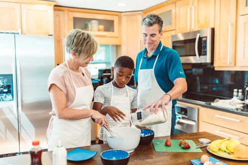 Free Happy Family Baking in the Kitchen Stock Photo