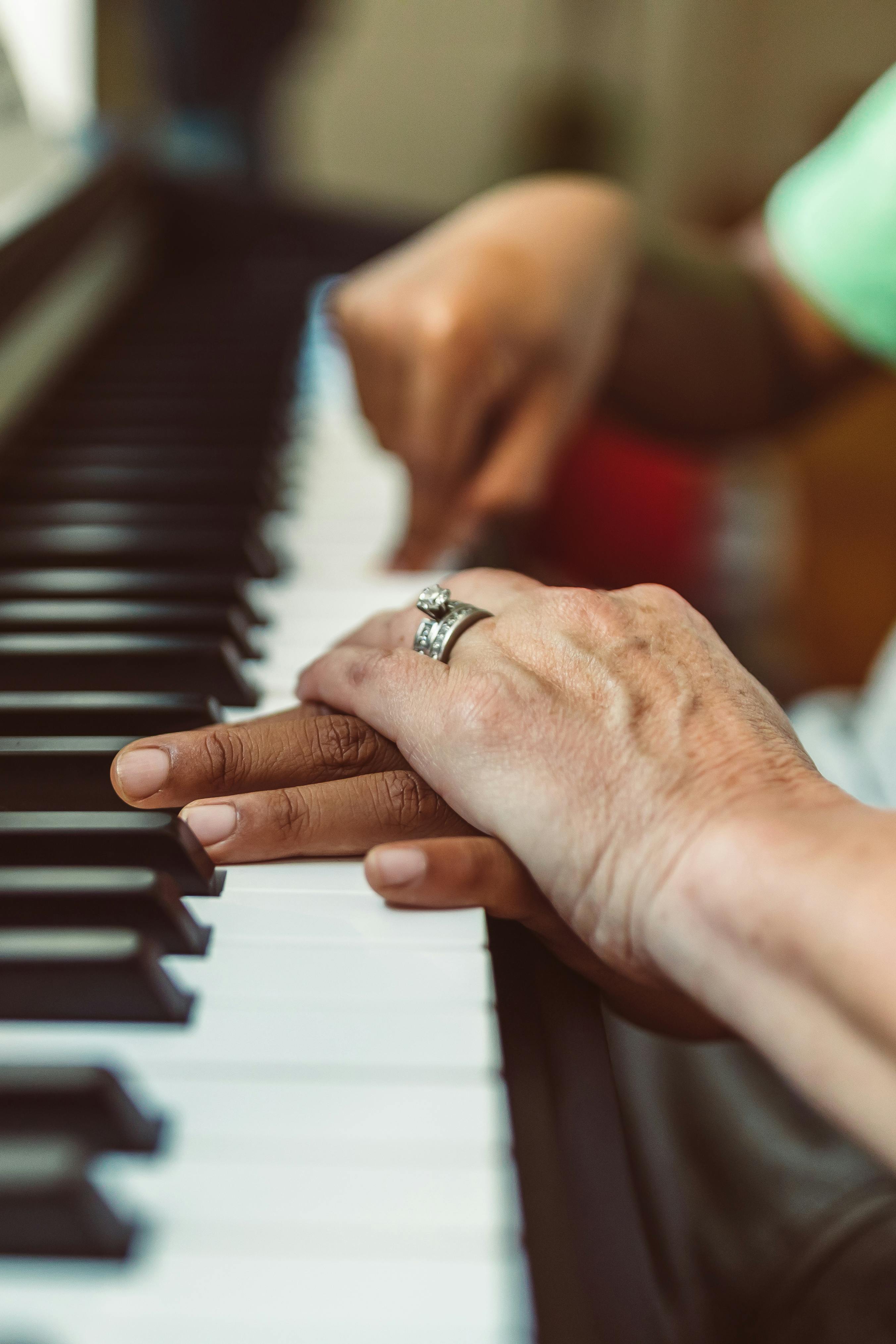 person wearing silver diamond ring