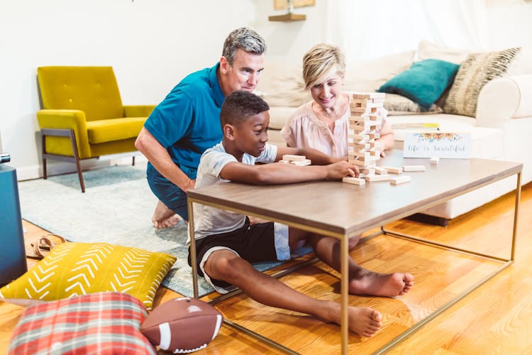 A Family Playing Jenga