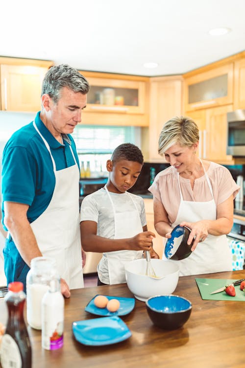 Free A Family Baking in the Kitchen Stock Photo