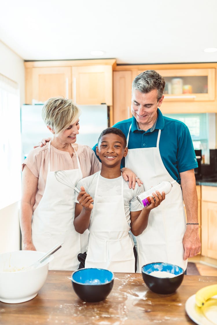 Happy Family Baking In The Kitchen