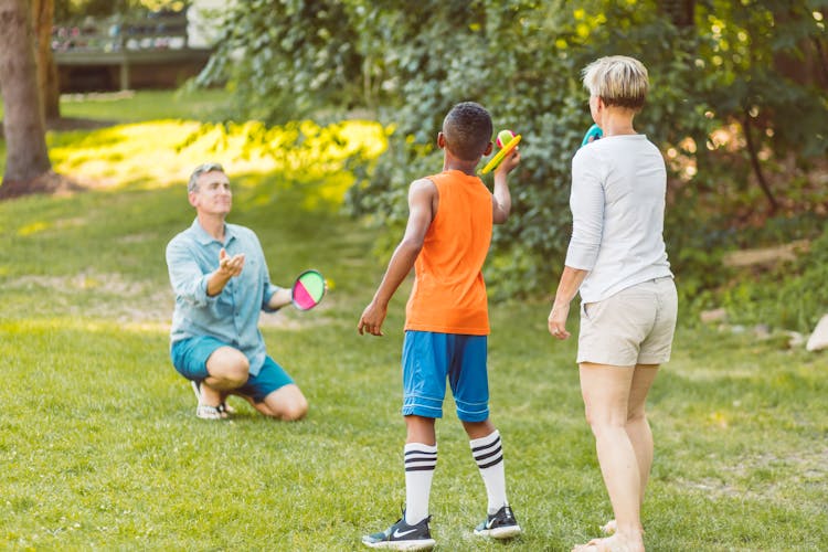 Family Playing Velcro Ball Game