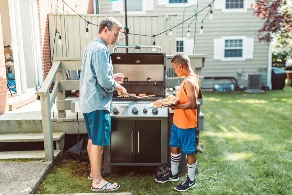 family enjoying outdoor grilling on patio - install outdoor grill family enjoying outdoor grilling on patio - install outdoor grill