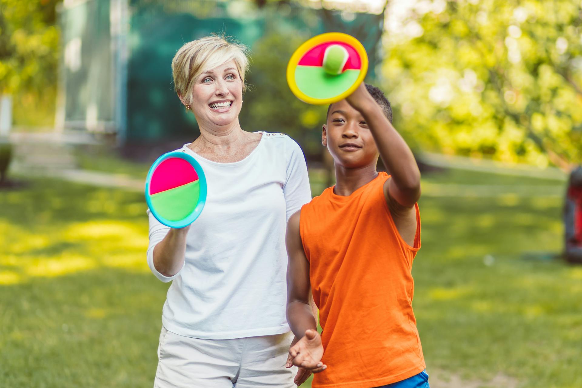 Mother and Son playing Velcro Ball Game