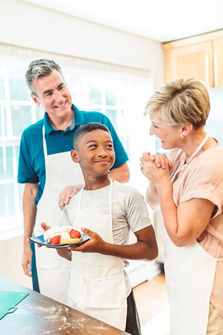 Happy Family Wearing White Aprons