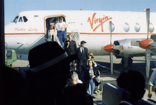 Passenger Getting Out of the Plane
