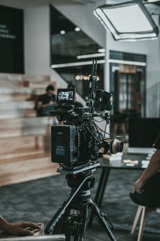 A professional film camera setup on a modern indoor set. Perfect for film and media projects.