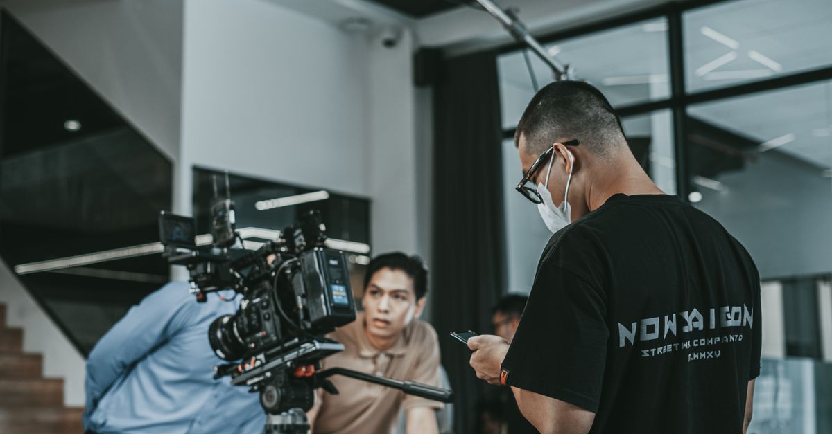 Camera Set Crew Camera Crew standing near a Camera Equipment · Free Stock Photo