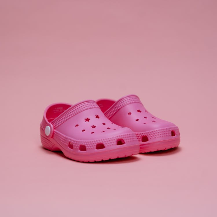 Close-up Photo Of Pink Rubber Clogs 