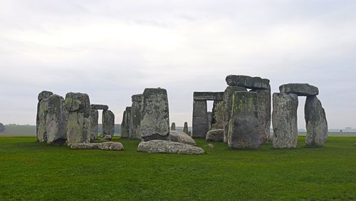 Free Scenic view of the ancient Stonehenge monument in England under a cloudy sky. Stock Photo
