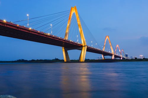 Evening Photo Long Suspended Bridge Over Wide River