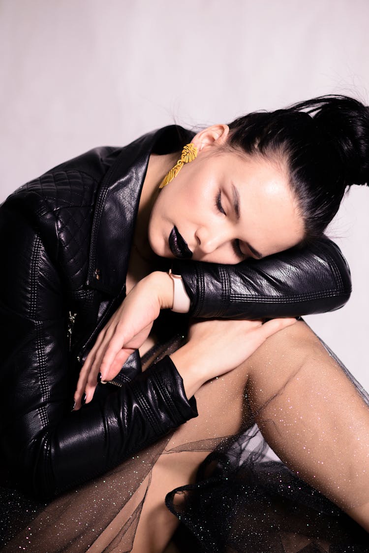 Woman In Leather Jacket With Black Lipstick