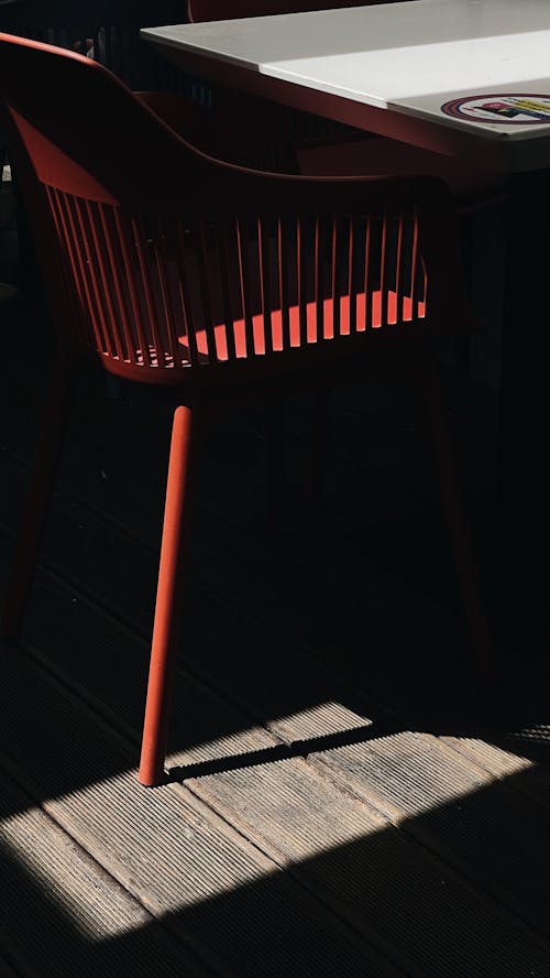 Free Red Armchair Near a White Table Stock Photo