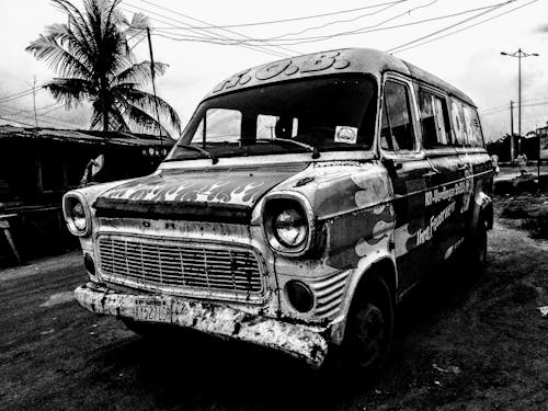 Abandoned Van in Grayscale Photography