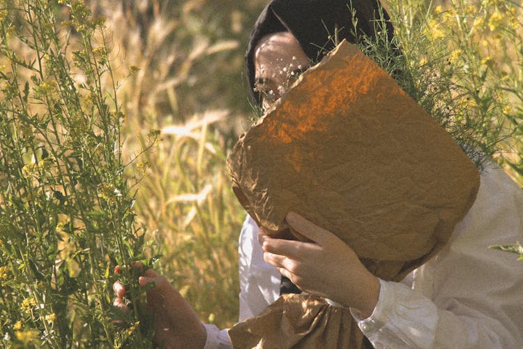 Woman Picking On Plants 