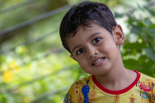 Free stock photo of boy showing teeth Stock Photo