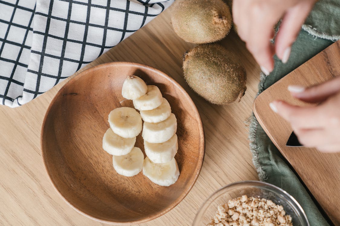 Free White Round Food on Brown Wooden Round Plate Stock Photo