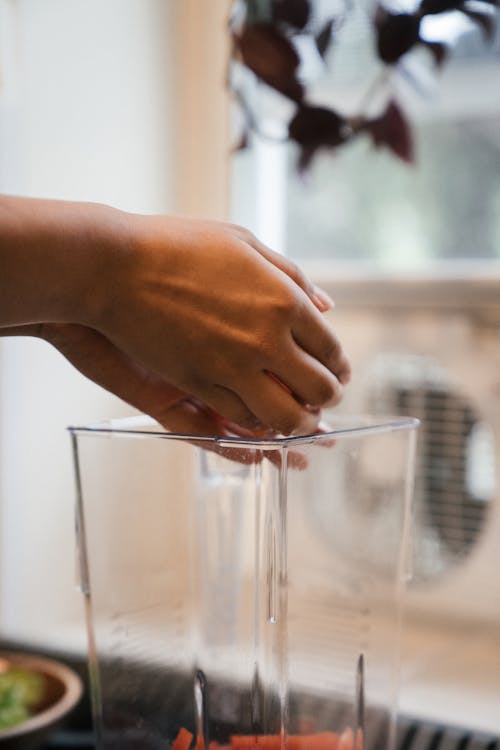 Close up of a Person Preparing a Drink