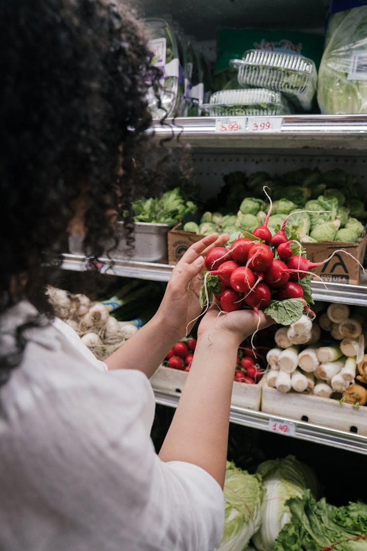 Person Holding Garden Radishes 