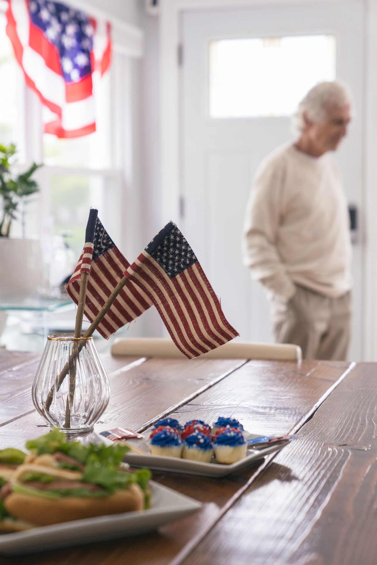 patriotic-gallery-2 Mini American flags in a glass vase on a table