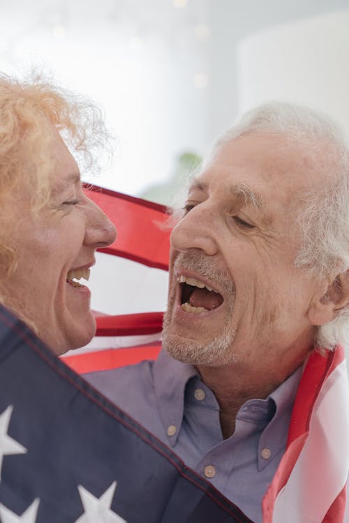 Kostenloses Stock Foto zu Ã„lteren, amerikanische flagge, blond