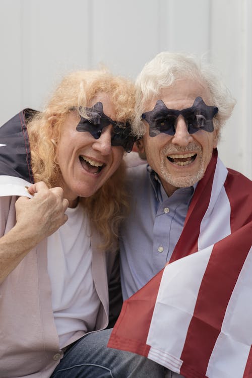 Бесплатное стоковое фото с американский флаг, близость, блондинка
