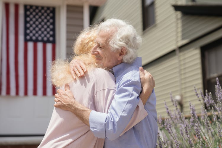 Affectionate Elderly Couple Hugging Each Other 