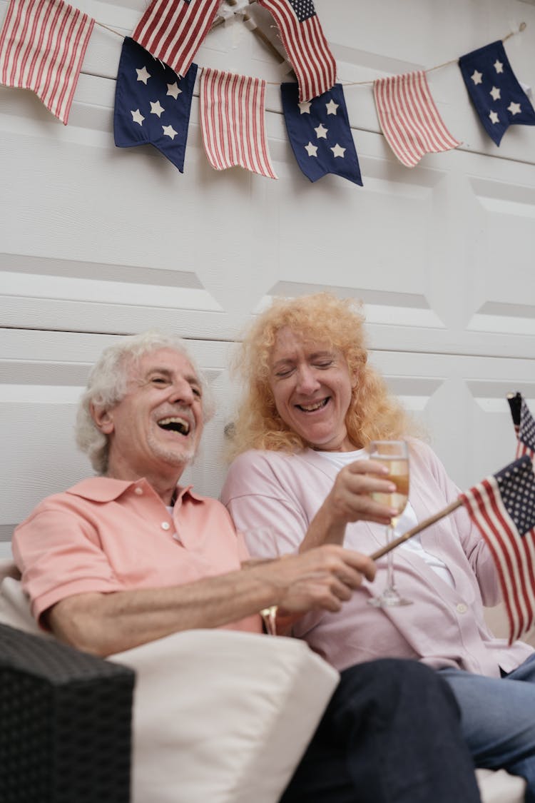 Happy Elderly Couple Celebrating Independence Day 