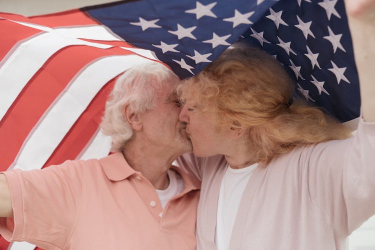 An Elderly Couple Kissing